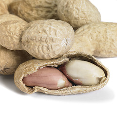 Image showing half peeled peanut