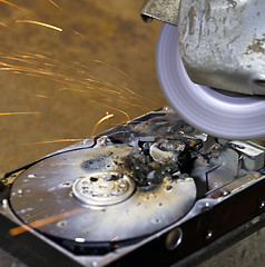 Image showing hard disk driveand angle grinder