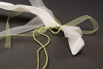 Image showing decorative white and green bow