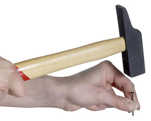 Image showing hammering in white back