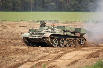 Image showing offroad scenery with driving tank