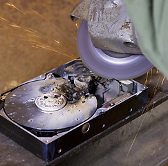 Image showing hard disk driveand angle grinder