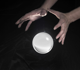 Image showing crystal ball and hands around