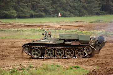 Image showing offroad scenery with driving tank