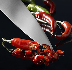 Image showing chillies and kitchen knife