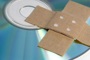 Image showing adhesive plaster and CD ROM detail