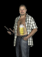 Image showing man with painted beer belly