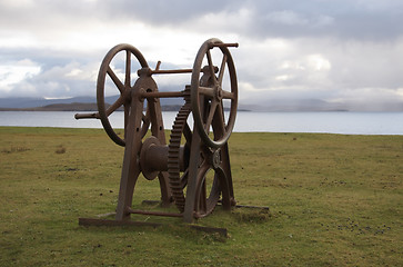 Image showing rusty old winch seaside in Scotland