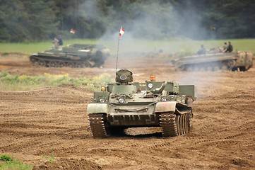 Image showing offroad scenery with driving tank