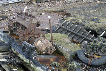 Image showing rotten boat with engine
