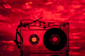 Image showing Cassette tape and multicolored lights