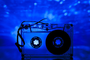 Image showing Cassette tape and multicolored lights