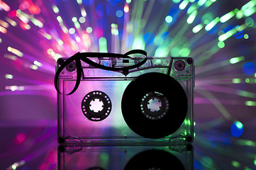 Image showing Cassette tape and multicolored lights