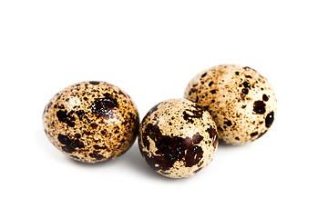 Image showing three quail eggs