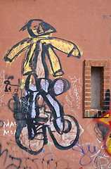 Image showing Graffiti paintings on wall. Dirty city wall