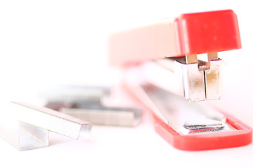 Image showing A red stapler