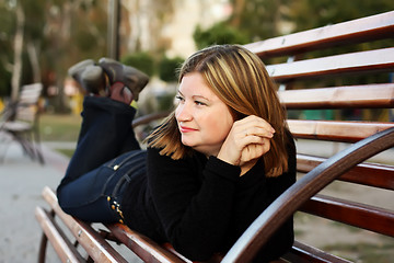 Image showing Girl on a bench