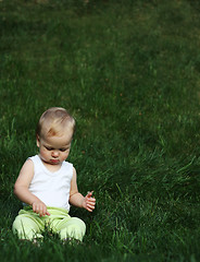 Image showing Liitle boy on a grass