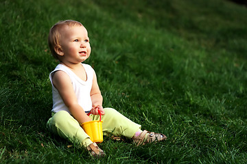 Image showing Little boy on a grass