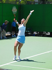 Image showing Female Tennis player serving