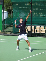 Image showing Male tennis player serving