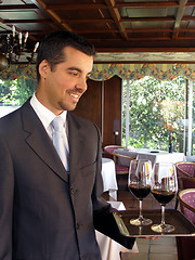 Image showing Butler is serving wine 3