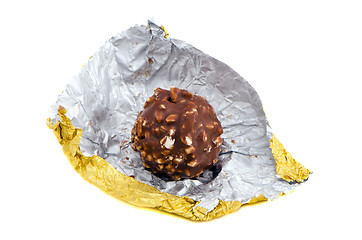 Image showing Candy coated chocolate and nut  golden isolated 