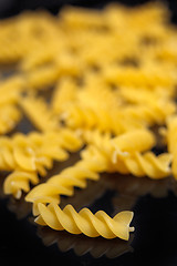 Image showing Italian pasta fusilli over black