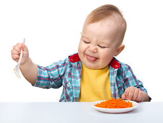 Image showing Little boy refuses to eat