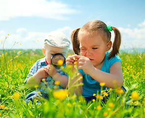 Image showing Children are playing on green meadow