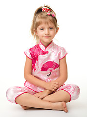 Image showing Cute little girl in pink ba ba shirt (Vietnamese)