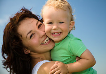 Image showing Child with mother play outdoors