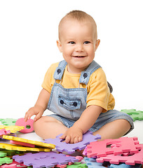 Image showing Little boy play with alphabet