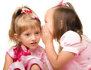 Image showing Two little girls are chatting