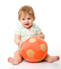 Image showing Cute little child is playing with soccer ball