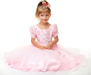 Image showing Cute little girl in pink dress