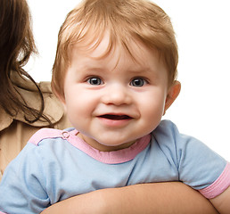 Image showing Cute little boy in mother's hands