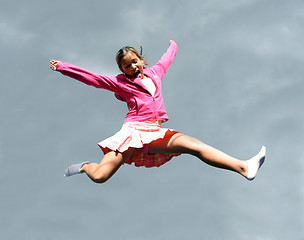 Image showing Jumping happy girl