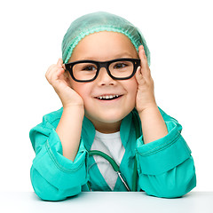 Image showing Little girl is playing doctor with stethoscope