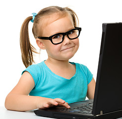 Image showing Little girl with laptop