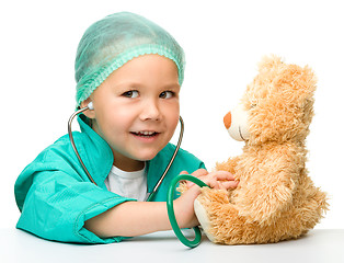 Image showing Little girl is playing doctor with stethoscope