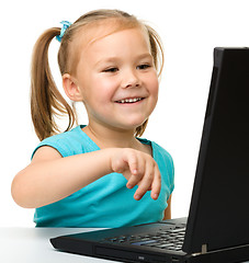 Image showing Little girl with laptop