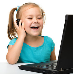 Image showing Little girl with laptop