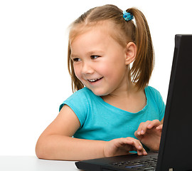 Image showing Little girl with laptop