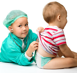 Image showing Children are playing doctor with stethoscope