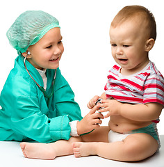 Image showing Children are playing doctor with stethoscope