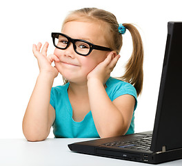 Image showing Little girl with laptop