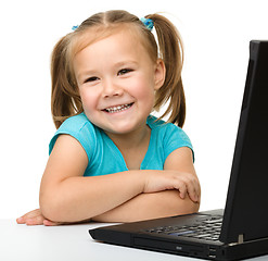 Image showing Little girl with laptop