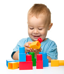 Image showing Little boy with building bricks