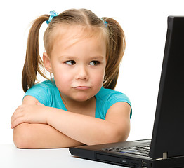 Image showing Little girl with laptop